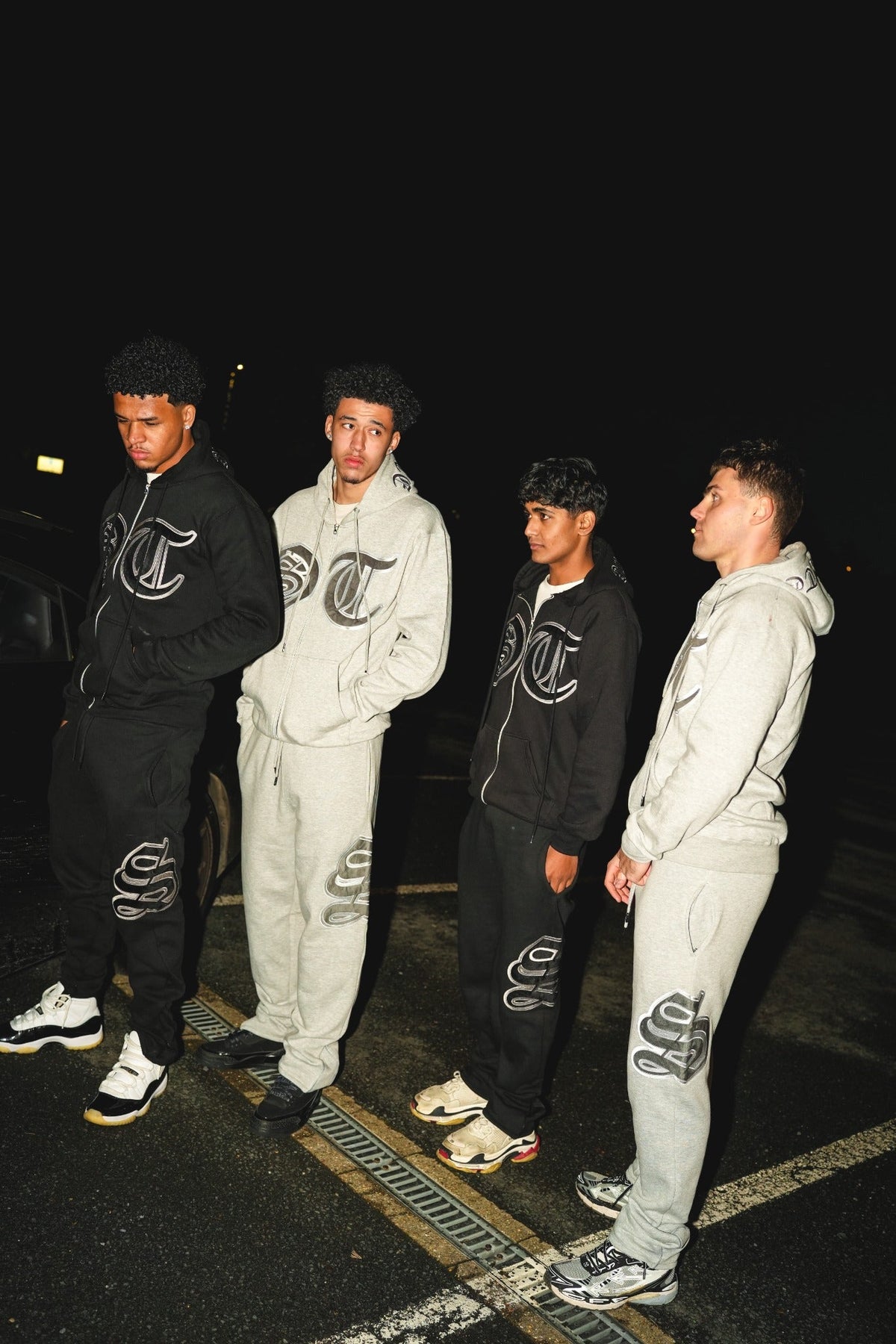 Secrète Clothing black and grey tracksuits editorial photo