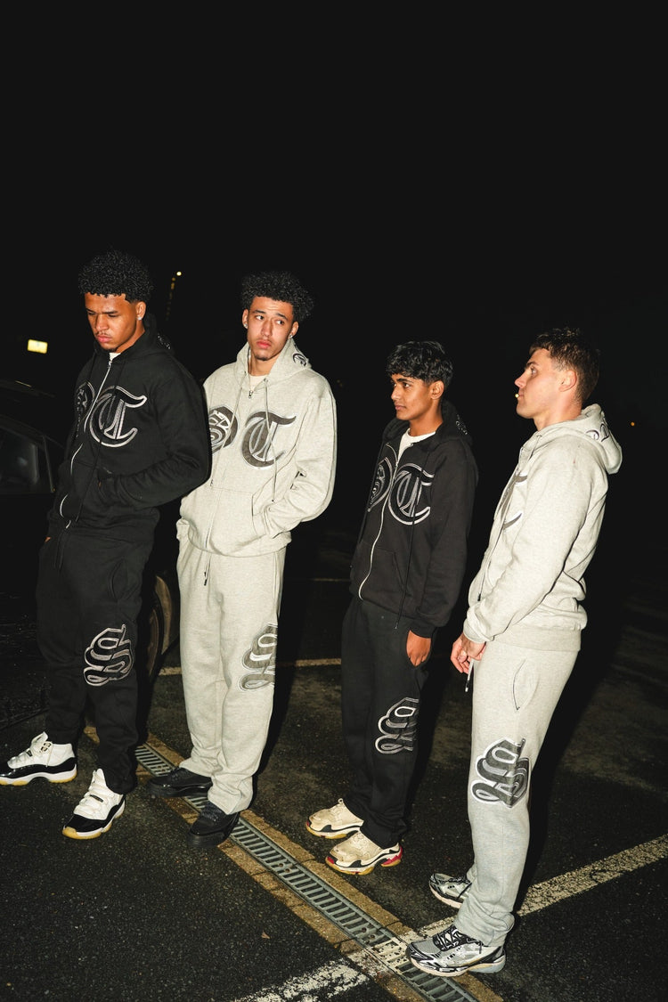 Secrète Clothing black and grey tracksuits editorial photo