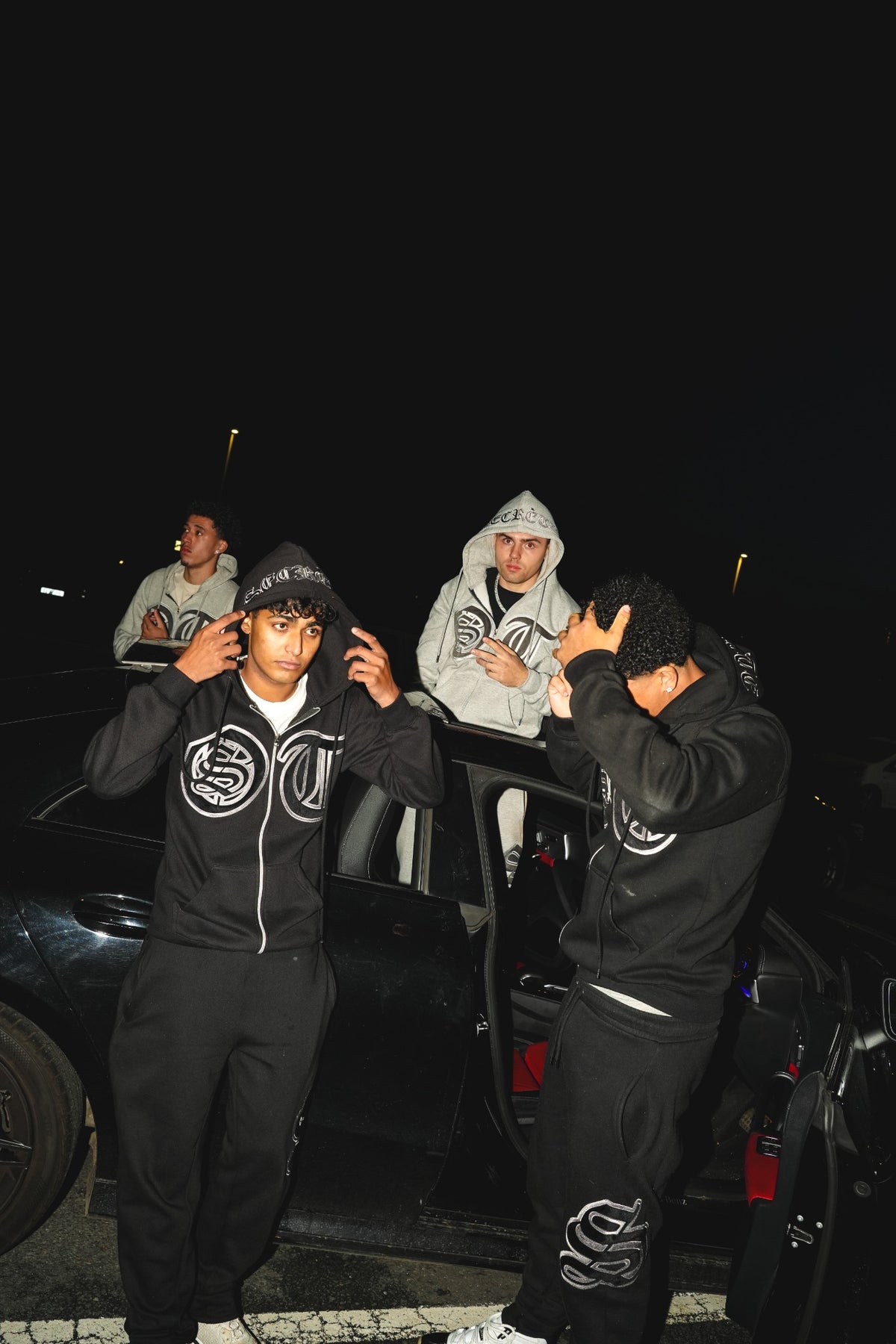 Black tracksuit lifestyle photo
